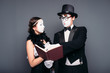 © Nomad_Soul - Two pantomime theater performers posing with book