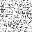 Vector seamless pattern. Hand drawn polka dot texture. Simple structure. Abstract background with many scattered pieces. Black and white design. Illustration for wallpaper, wrapping paper, textile.