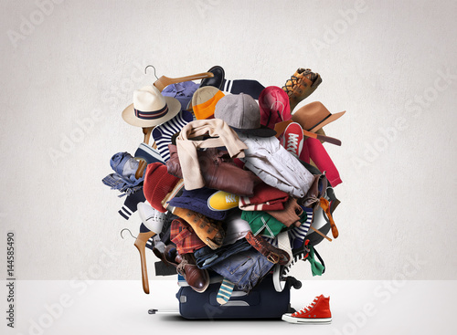 Fotografía Big heap of different clothes and shoes