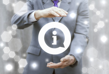 FAQ and IDEA Business concept. Businessman offers bubble i letter icon on virtual screen. Info support. Help, guide. Customer service orientation. Providing information to customers.