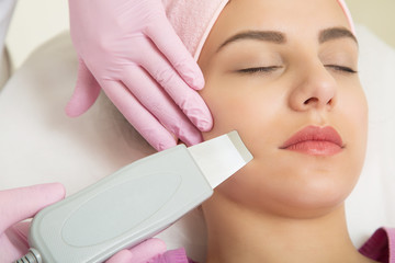 Young woman visiting cosmetologist