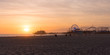 Santa Monica Pier sunset with cloud and orange sky, Los Angeles, USA
