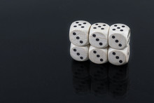 Dice Six Triples On A Black Background
