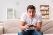 © Elnur - Man addicted to computer games