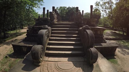 Wall Mural - Climbing the Ancient Steps of the Royal Council Chamber in Polonnaruwa