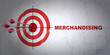 Marketing concept: target and Merchandising on wall background
