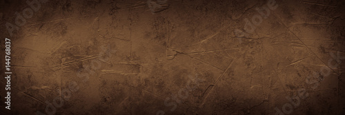 Fototapeta Brown empty concrete stone texture. Slate background. Long banner format.