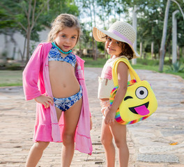 The little girls posing in sunny day in Brazil