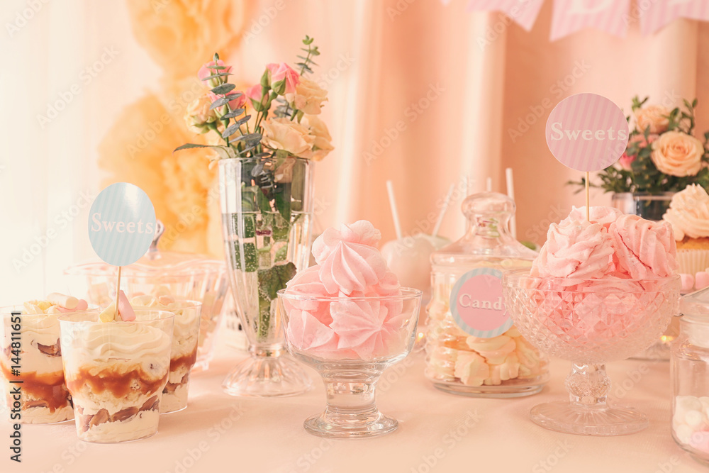 Candy bar. Table with different sweets for party