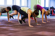 © Syda Productions - group of people exercising in gym