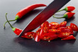 © Igor Normann - Knife and red chilli pepper