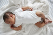 © Monkey Business - Newborn Baby Sleeping In Nursery Cot