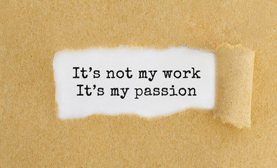 text it's not my work it's my passion appearing behind ripped brown paper.