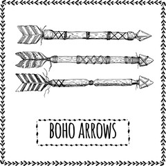 Wall Mural - Tribal arrow set in ethnical pattern with feathers. boho elements