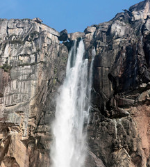 Wall Mural - The Victoria falls is the largest curtain of water in the world (1708 m wide). The falls and the surrounding area is the National Parks and World Heritage Site - Zambia, Zimbabwe