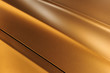 Surface of bronze sport sedan car metal hood, part of vehicle bodywork, steel gradient line pattern, selective focus