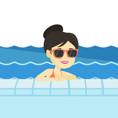 Sticker - Smiling young woman in swimming pool.