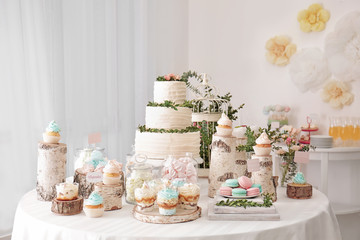 Candy bar. Table with different sweets for party