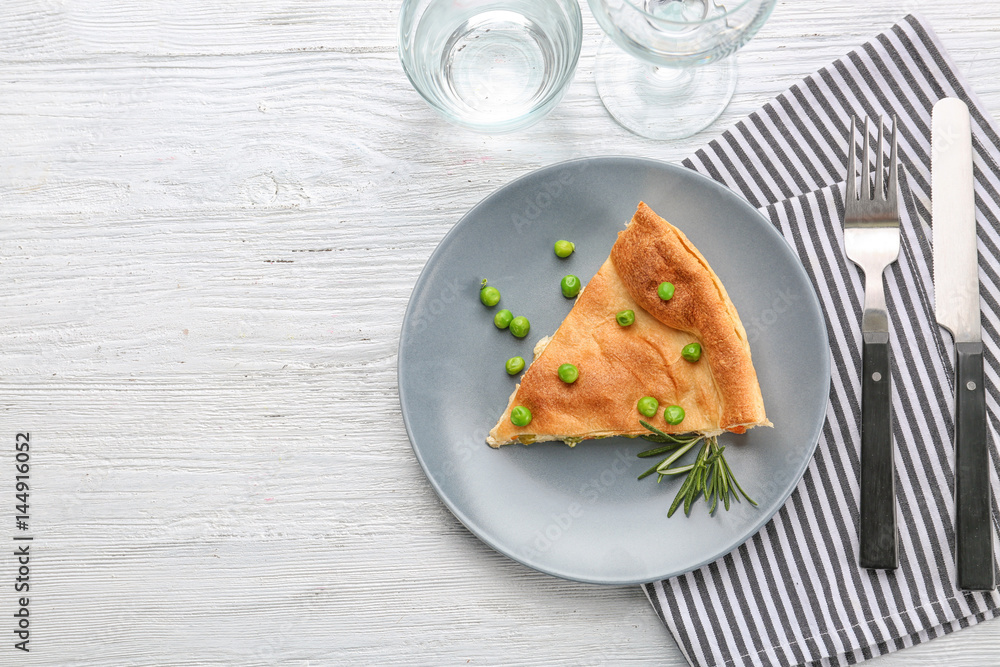 Piece of tasty chicken pot pie on plate