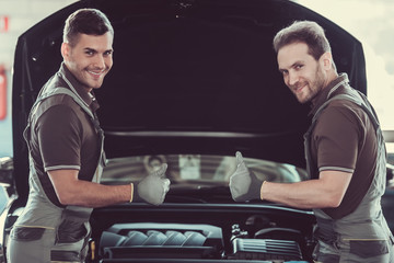 Wall Mural - Handsome auto service workers