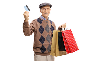 Poster - Mature man with a credit card and shopping bags