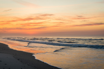 Wall Mural - Sandy Beach in ventnor city beach in atlantic city, new jersey at sunrise