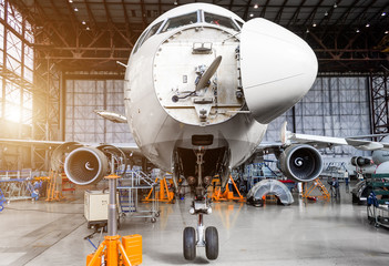 Wall Mural - Aircraft in the hangar on the C check