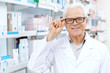© Nestor - Senior male pharmacist working at his drugstore