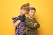 © Africa Studio - Cute stylish children on color background