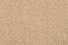A Background Of A Scratchy Burlack Material In An Even Light Brown Color.