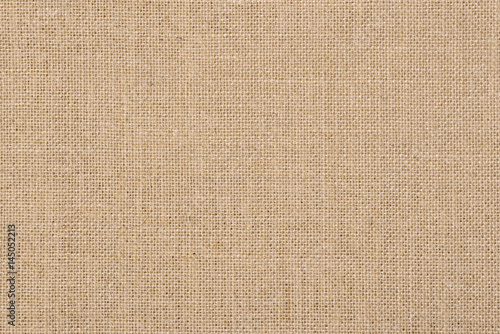 Fotomural A background of a scratchy burlack material in an even light brown color