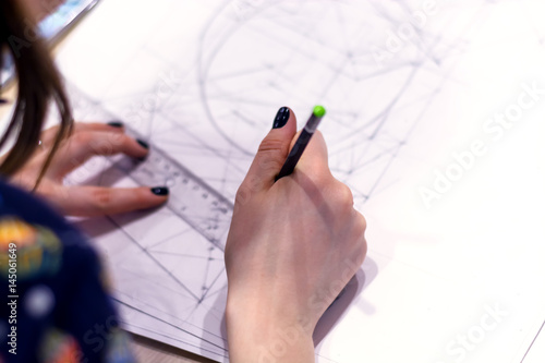 Girl Architect Draws A Plan Design Geometric Shapes By Pencil On