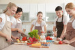© Africa Studio - Group of people at cooking classes