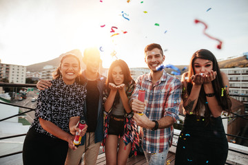 Wall Mural - Best friends on a rooftop party