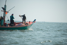 Phang-Nga, Thailand - October 31, 2015  Fishermen On Boat Fishing At Sea In Phang-Nga, Thailand