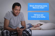 Man texting on smartphone while wife sleeps