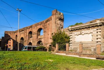 Wall Mural - rome, italy. the tram passes under the 