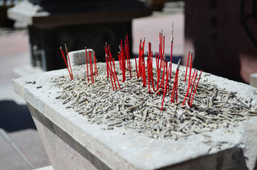 Burning of incense sticks at chinese temple