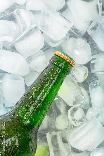 Naklejka - mata magnetyczna na lodówkę Bottles of cold and fresh beer with ice