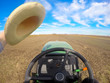 Agriculture. Farmer driving tractor on the field. Driver point of view. Agronomy.