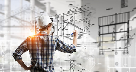 engineer woman draw layout . mixed media