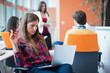 © FS-Stock - happy young business woman with her staff, people group in background at modern bright office indoors