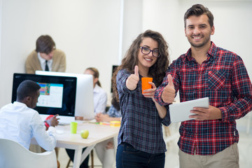 young startup business people, couple working on tablet computer