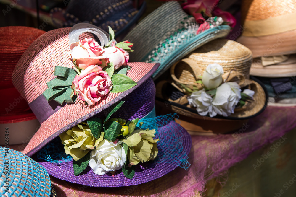 flower vintage looking hats Pretty vintage lady hats for sale, decorated with roses, flowers and  Stock Photo Adobe Stock