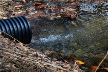 Culvert With Clean Clean Mountain Water Flowing.