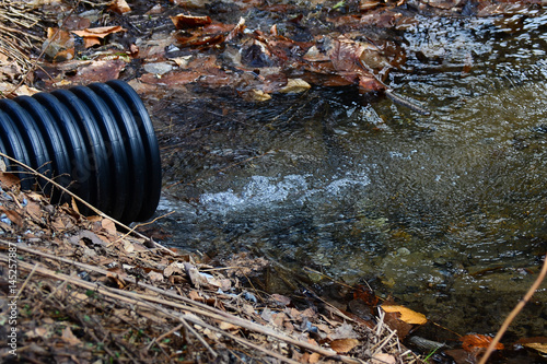 Valokuva Culvert with clean clean mountain water flowing.