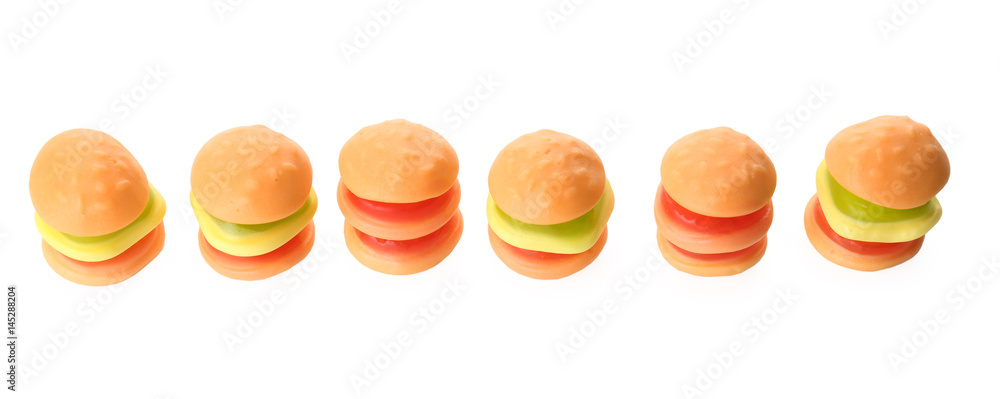 Tasty jelly candies on white background