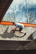 © Coka - young man doing parkour in the city