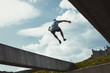 © Coka - young man doing parkour in the city