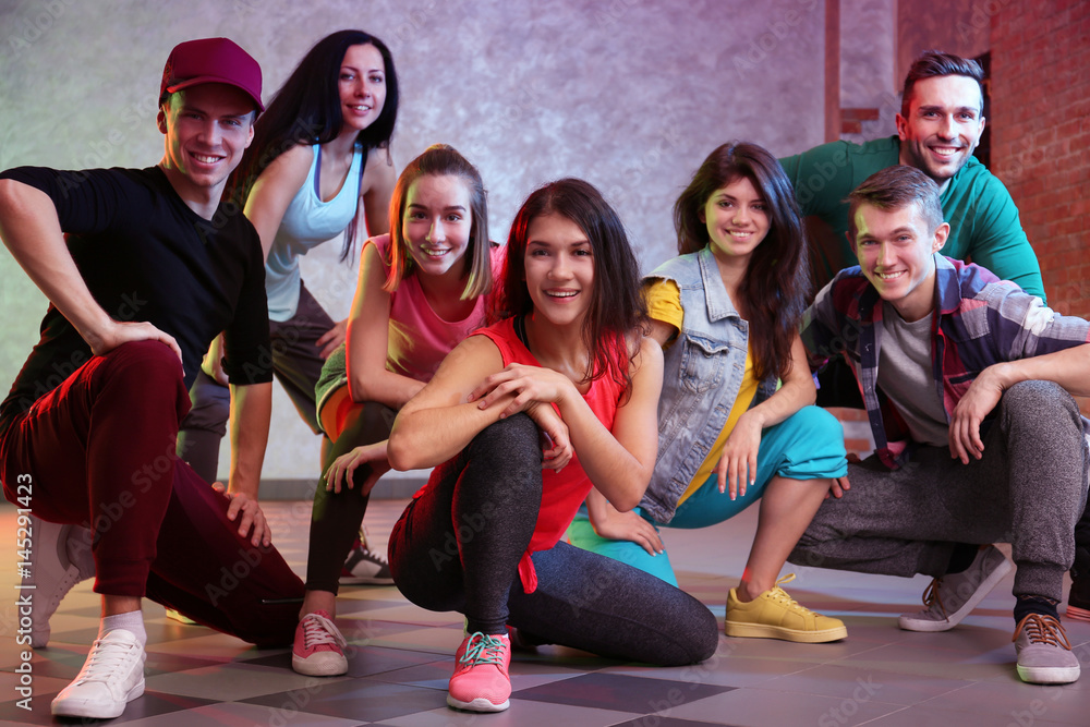 Group of young hip-hop dancers in studio